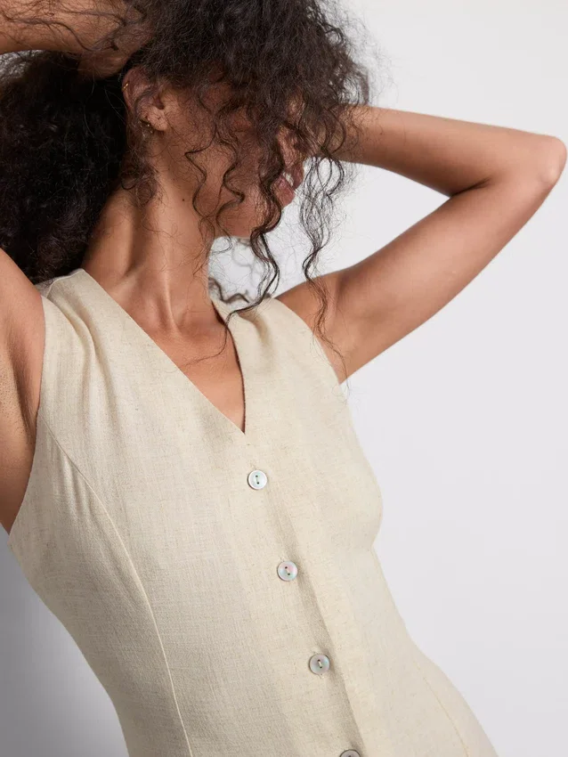 Mouwloze mini-jurk met V-hals