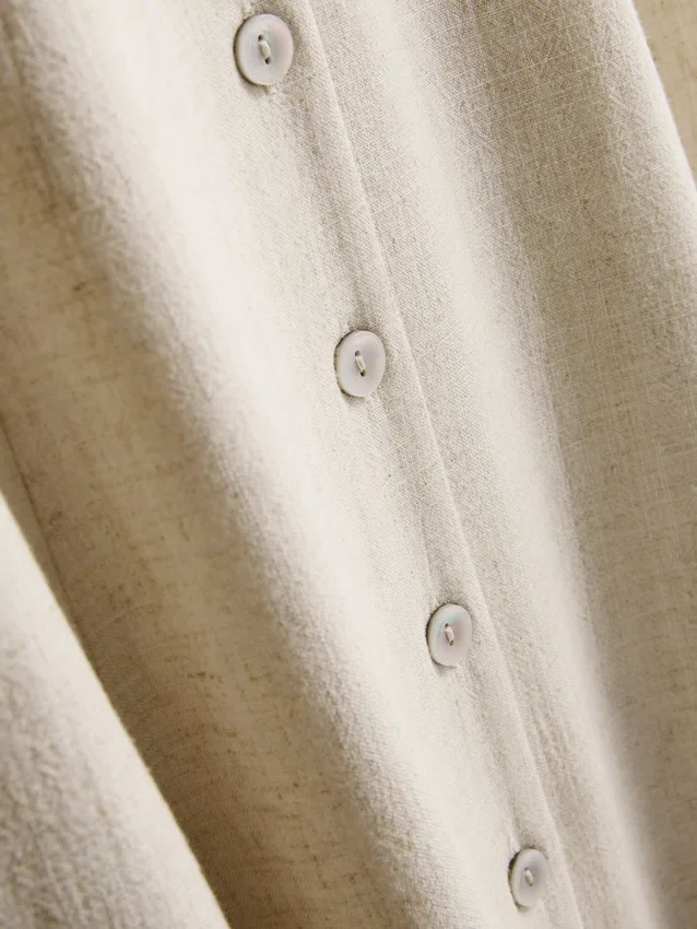 Mouwloze mini-jurk met V-hals