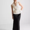 Mouwloze top met V-hals en peplum