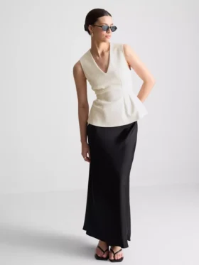 Mouwloze top met V-hals en peplum