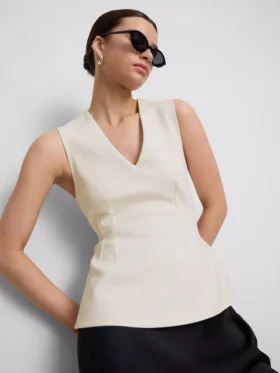 Mouwloze top met V-hals en peplum