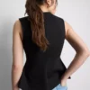 Mouwloze top met V-hals en peplum