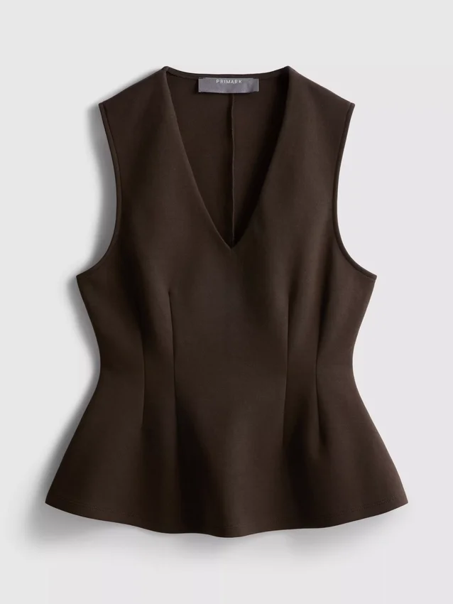 Mouwloze top met V-hals en peplum