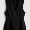 Mouwloze top met V-hals en peplum