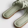 Mules met geweven bandjes