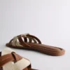 Mules met geweven bandjes