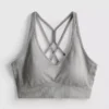 Naadloze, glanzende sportieve crop top