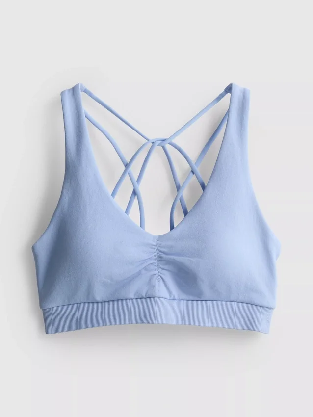 Naadloze sportieve crop top met bandjes