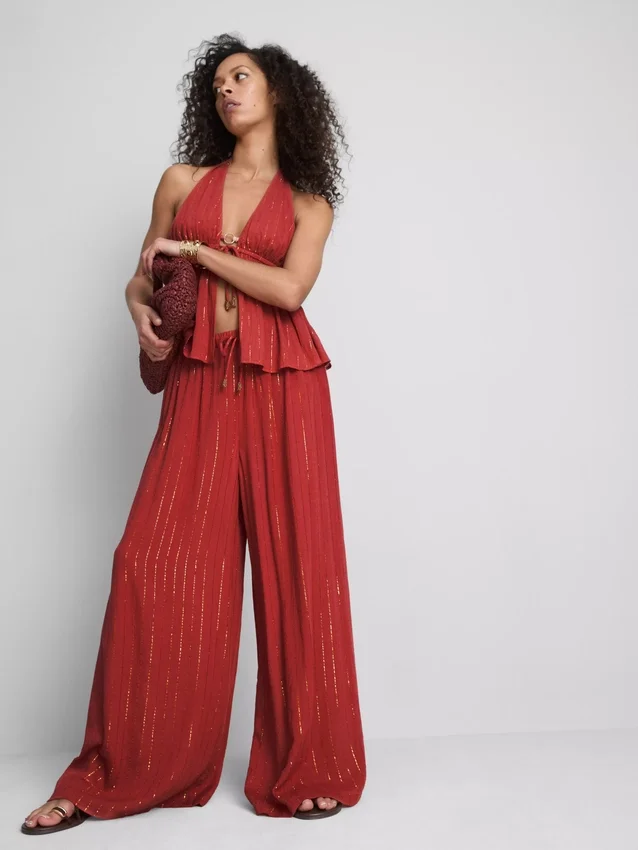 Paula Echevarría broek met wijde pijpen en glitters