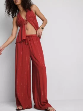 Paula Echevarría broek met wijde pijpen en glitters