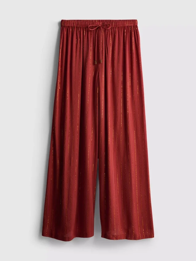 Paula Echevarría broek met wijde pijpen en glitters