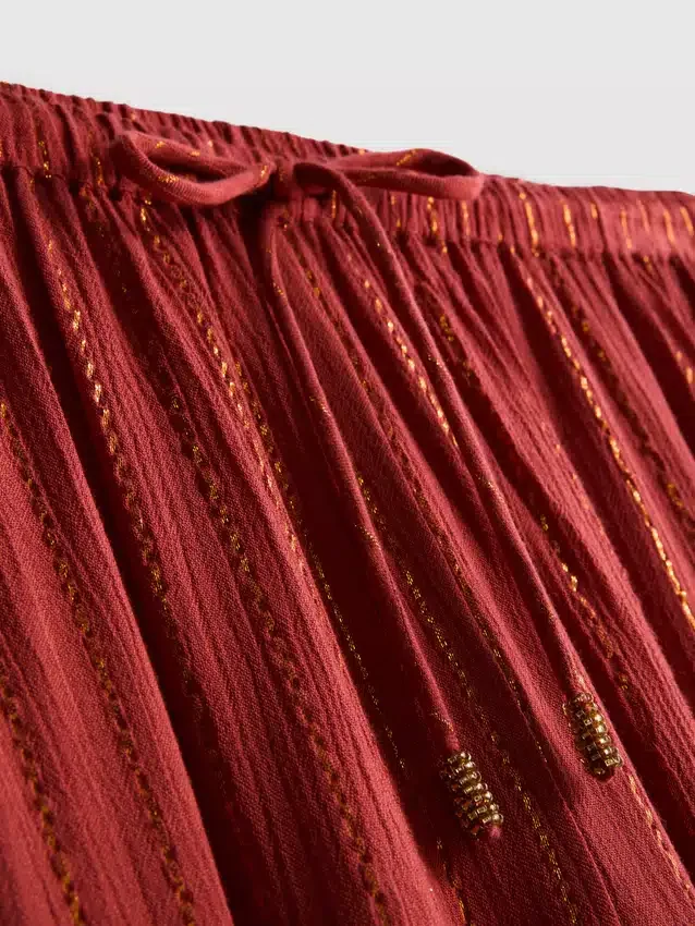 Paula Echevarría broek met wijde pijpen en glitters