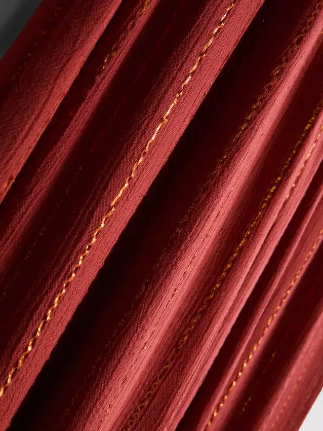 Paula Echevarría broek met wijde pijpen en glitters