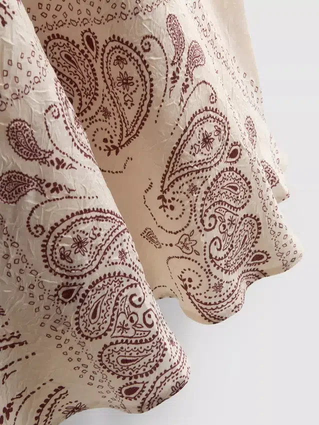 Paula Echevarría maxi-rok van satijn met schuine snit en print