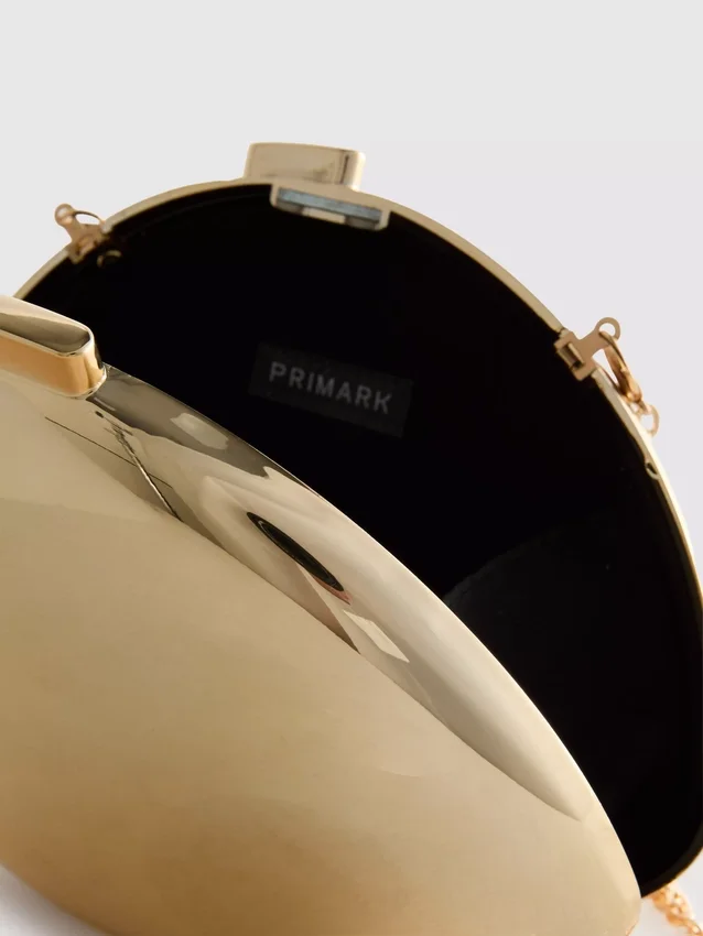 Paula Echevarría metallic ovale crossbodytas