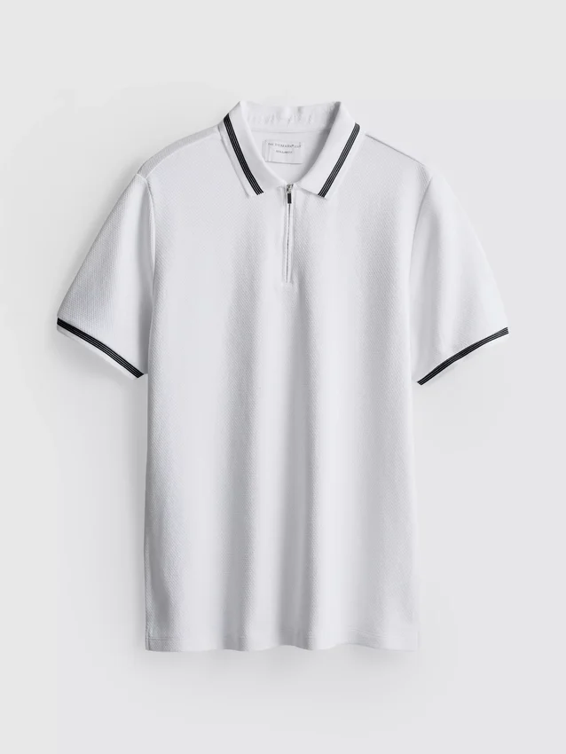 Polo met ritssluiting en structuur