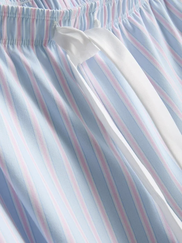Pyjama's met satijnen strik en print