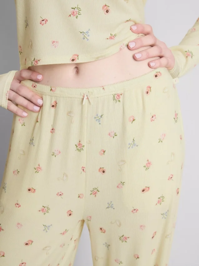 Pyjamabroek met bloemenprint en geribde boorden