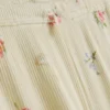 Pyjamabroek met bloemenprint en geribde boorden