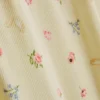 Pyjamabroek met bloemenprint en geribde boorden
