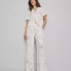 Pyjamabroek met bloemenprint en wijde pijpen