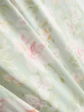 Pyjamabroek met bloemenprint en wijde pijpen