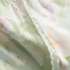 Pyjamabroek met bloemenprint en wijde pijpen