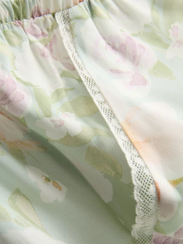 Pyjamabroek met bloemenprint en wijde pijpen