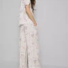 Pyjamabroek met bloemenprint en wijde pijpen