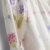 Pyjamabroek met bloemenprint en wijde pijpen