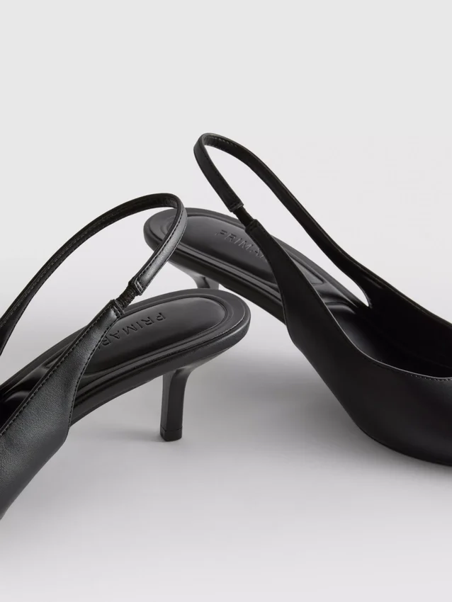 Slingback-hakken van imitatieleer