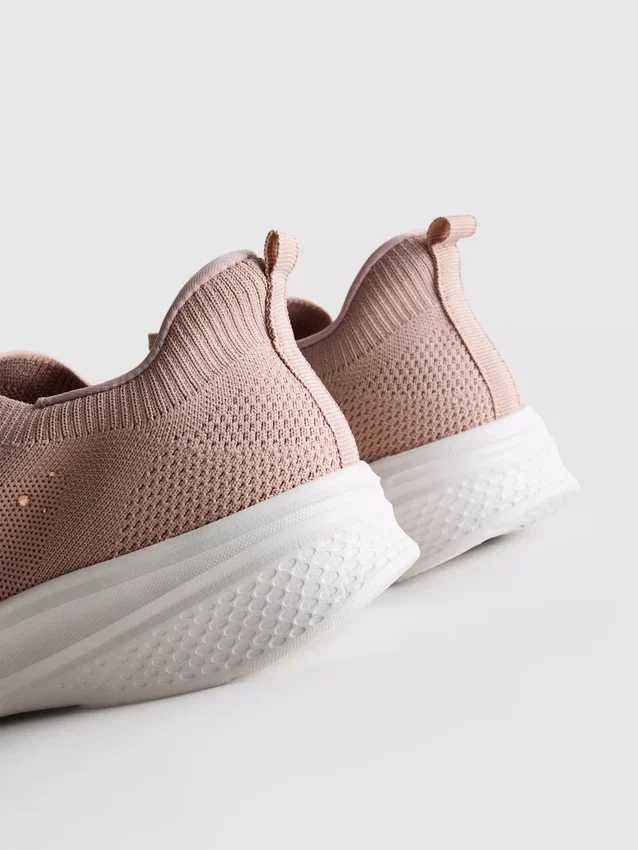 Slip-on sneakers met diamanté-details