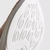Slip-on sneakers met diamanté-details