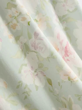 Slipjurk met bloemenprint en kanten rand