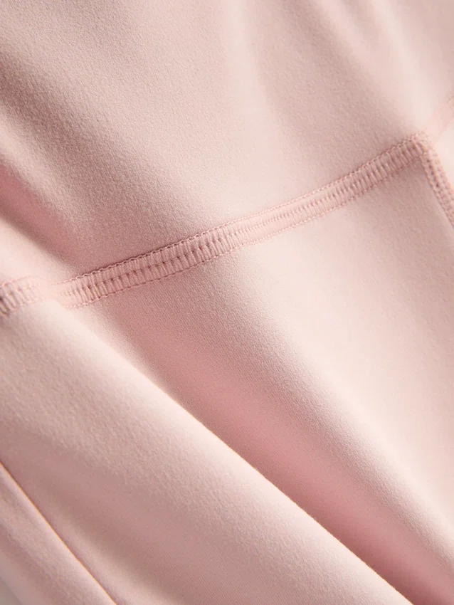 Sportlegging met hoge taille en uitlopende pijpen