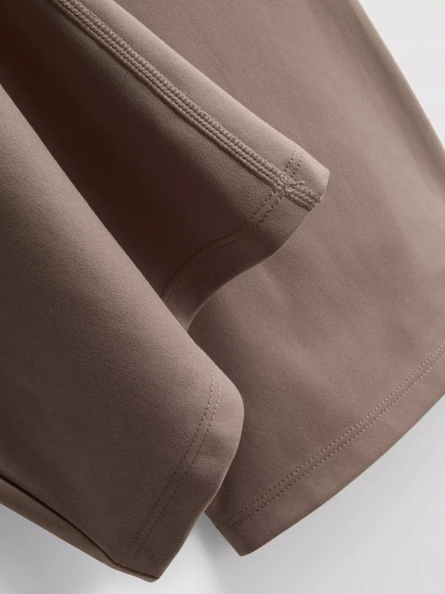 Sportlegging met hoge taille en uitlopende pijpen