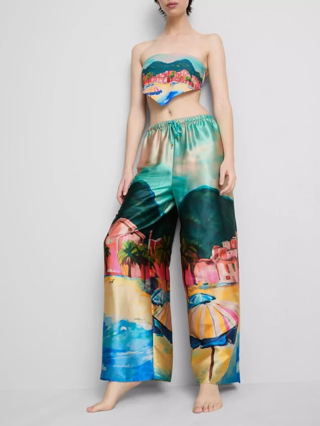 Strandbroek van satijn met landschappelijke print