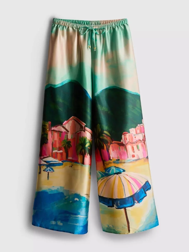 Strandbroek van satijn met landschappelijke print