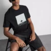 T-shirt met surferfoto