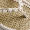 Teenslippers met zeegras-effect