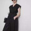 The Edit linnen wikkelblouse met V-hals