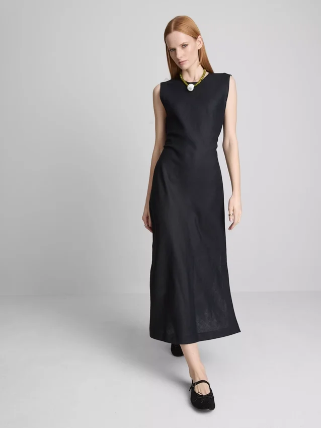 The Edit mouwloze linnen midijurk