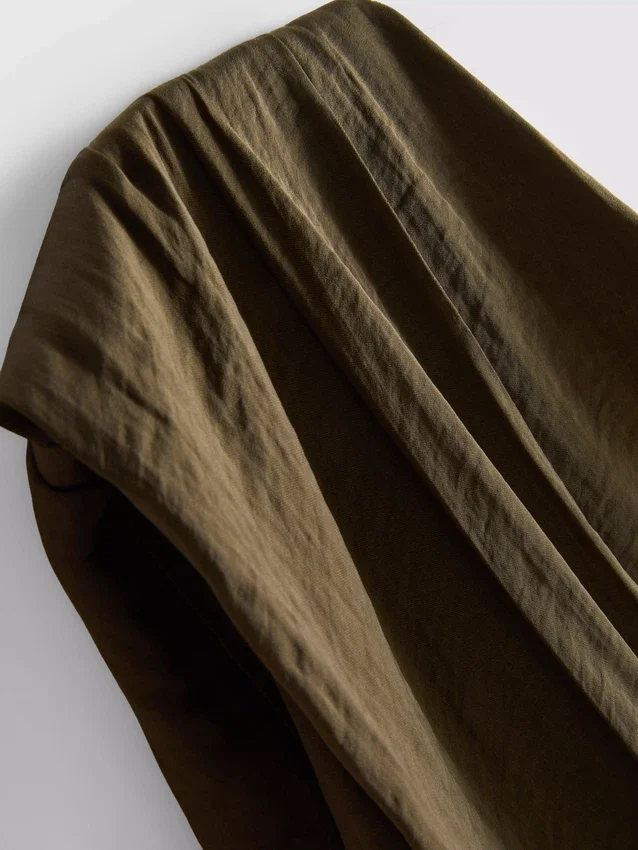 The Edit top with draped details