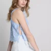 Top met broderie en strik aan de zijkant