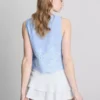 Top met broderie en strik aan de zijkant