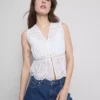 Top met katoenen broderie en strik aan de voorkant