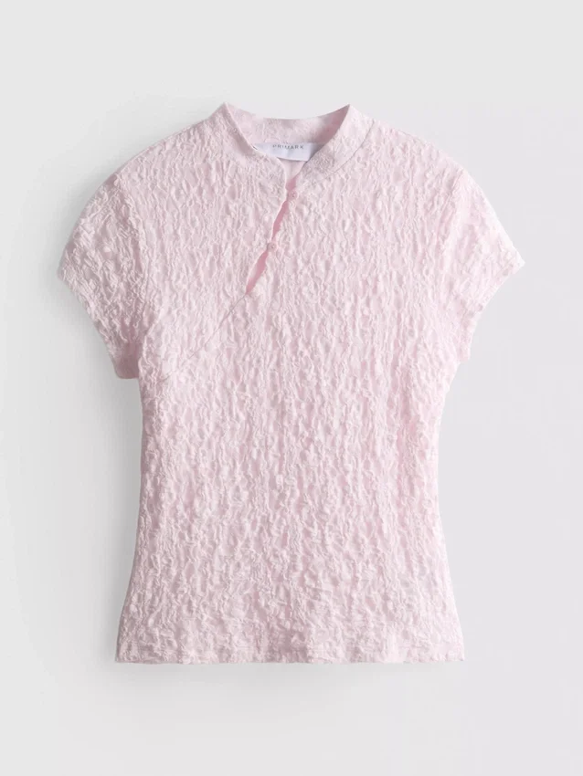 Top met textuur en hoge kraag