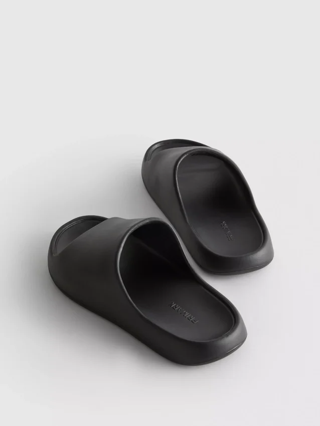 Voorgevormde badslippers