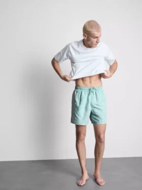 Zwemshort met geborduurde bladeren