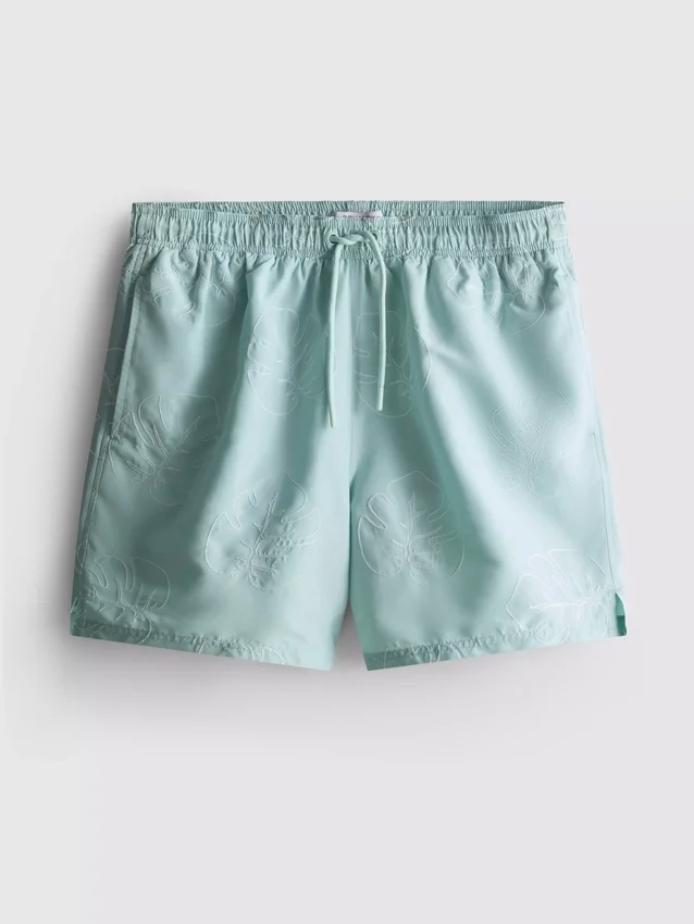 Zwemshort met geborduurde bladeren